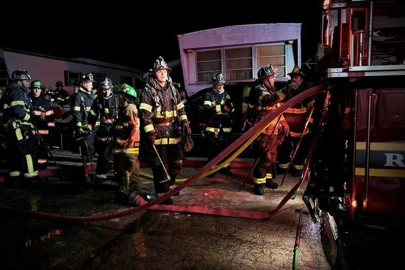 Aston Township firefighters and command staff on the scene of a nighttime structure fire
